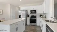 3004 Platinum Circle, West End, NC 27376 — 4-bedroom home in Gretchen Pines, West End, NC, photo 11 of 25: Kitchen