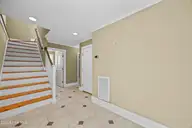 185 Seawatch Way, Kure Beach, NC 28449 — 5-bedroom waterfront home in Seawatch, Kure Beach, NC, photo 24 of 72: 9_hallway
