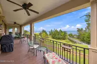 609 Neuse Harbour Boulevard, New Bern, NC 28560 — 4-bedroom waterfront home in Neuse Harbour, New Bern, NC, photo 4 of 57: Waterfront porch