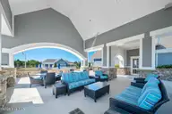 157 Whispering Pine Lane, Holly Ridge, NC 28445 — lot in Summerhouse On Everett Bay, Holly Ridge, NC, photo 22 of 27: Clubhouse seating