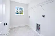 807 Hidden Bridge Drive, Jacksonville, NC 28546 — 5-bedroom home in Towne Pointe, Jacksonville, NC, photo 17 of 20: Laundry Room