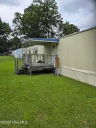 708 Elma Drive, Kinston, NC 28501 — manufactured home, Kinston, NC, photo 2 of 12: Back porch