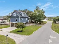 681 Forest Drive SE, Bolivia, NC 28422 — 2-bedroom waterfront home in Sunset Harbor, Bolivia, NC, photo 5 of 32: 5-web-or-mls-DJI_20250828123257_0252_D