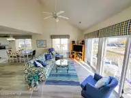 2005 N Shore Drive, Surf City, NC 28445 — 3-bedroom waterfront home in Old Settlers Beach, Surf City, NC, photo 5 of 27: 2005 N Shore Dr (By The Sea [Int Refresh
