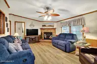 217 Magnolia Drive, Sunset Beach, NC 28468 — 3-bedroom manufactured home in Seaside Station, Sunset Beach, NC, photo 10 of 48: 10-kahunaphoto.com (11 of 48)