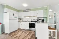 4105 Ocean Drive E&W, Emerald Isle, NC 28594 — 8-bedroom waterfront home in Emerald Isle By The Sea, Emerald Isle, NC, photo 14 of 68: West Side