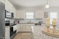 9414 Barnstormer Drive, Carolina Shores, NC 28467 — 3-bedroom waterfront home in Eagle Run, Carolina Shores, NC, photo 11 of 41: Kitchen