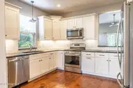 125 Bree Court, Aberdeen, NC 28315 — 5-bedroom home in Devonshire, Aberdeen, NC, photo 10 of 46: Kitchen with Stainless Steel Appliances
