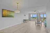 10300 Coast Guard Road D211, Emerald Isle, NC 28594 — 3-bedroom waterfront condo in Point Emerald Villas, Emerald Isle, NC, photo 21 of 54: Dining and Living Area
