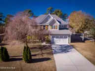 211 Cheswick Drive, Holly Ridge, NC 28445 — 3-bedroom home in The Preserve At Morris Landing, Holly Ridge, NC, photo 1 of 65: Front