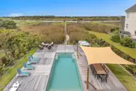 3713 Island Drive, North Topsail Beach, NC 28460 — 6-bedroom waterfront home, North Topsail Beach, NC, photo 2 of 75: View of back yard from back decks