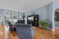 1013 Meadowlands Trail NW, Calabash, NC 28467 — 4-bedroom home in Meadowlands, Calabash, NC, photo 6 of 41: Living Area