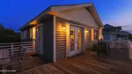 409 Bridgers Avenue, Topsail Beach, NC 28445 — 3-bedroom home in Topsail Inlet Terrace, Topsail Beach, NC, photo 3 of 67: twilight-03
