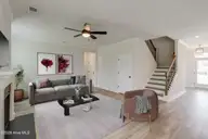 15 Lookout Point, Hampstead, NC 28443 — 5-bedroom waterfront home in East Wynd, Hampstead, NC, photo 15 of 19: Great Room 2 - Nottely - Virtual Staging