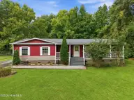 109 Southwest Drive, Newport, NC 28570 — 3-bedroom manufactured home in Nine Mile Estates, Newport, NC, photo 1 of 50: 1-web-or-mls-DJI_20260827102958_0053_D-e
