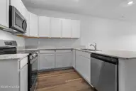 254 Arnette Drive 82 B, Shallotte, NC 28469 — 3-bedroom townhome in The Villas at Seaside, Shallotte, NC, photo 6 of 20: Kitchen View 1