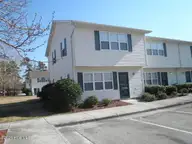 84 Crush Court, Swansboro, NC 28584 — 3-bedroom townhome in Pirates Cove Townhouses, Swansboro, NC, photo 1 of 29: Front View