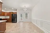 3235 Austin Avenue, New Bern, NC 28562 — 3-bedroom home in Longleaf Pines, New Bern, NC, photo 12 of 52: Dining to Kitchen