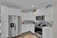 7202 E Yacht Drive, Oak Island, NC 28465 — 3-bedroom waterfront home in Tranquil Harbor, Oak Island, NC, photo 14 of 61: 7202 E Yacht Dr-5