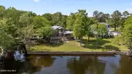 401 Harbor Drive, New Bern, NC 28560 — 2-bedroom waterfront home in Harbor Point, New Bern, NC, photo 3 of 55: 54-web-or-mls-DJI_20260414144830_0033_D