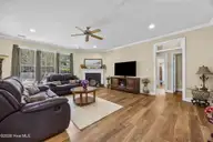 8746 Ramsbury Way, Wilmington, NC 28411 — 4-bedroom home in Plantation Landing, Wilmington, NC, photo 11 of 49: 11_living room