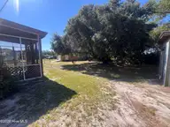 204 Diamond City Drive, Harkers Island, NC 28531 — 2-bedroom manufactured home in Earl Davis, Harkers Island, NC, photo 11 of 13: Backyard