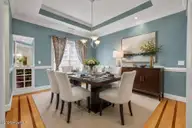 111 Wyndham Way, Wilmington, NC 28411 — 3-bedroom home in Wyndham Ridge, Wilmington, NC, photo 7 of 72: Virtually staged dining room