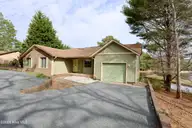 116 Shagbark Court, West End, NC 27376 — 3-bedroom waterfront home in Seven Lakes North, West End, NC, photo 4 of 65: Entry Drive Single Car