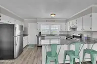603 N Anderson Boulevard, Topsail Beach, NC 28445 — 4-bedroom waterfront home in Topsail Beach, Topsail Beach, NC, photo 19 of 35: IMG_4061