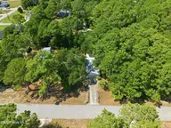 140 Lousan Drive, Cape Carteret, NC 28584 — 3-bedroom home, Cape Carteret, NC, photo 9 of 50: 12-print-DJI_20260826144300_0007_D