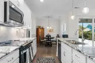 2267 Reefside Loop NE, Leland, NC 28451 — 3-bedroom home in Compass Pointe, Leland, NC, photo 13 of 71: kitchen