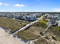 402 1 Fort Fisher Boulevard N, Kure Beach, NC 28449 — waterfront lot in Kure Dunes, Kure Beach, NC, photo 21 of 55: 18-web-or-mls-DJI_20251022160021_0935_D