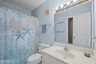 1308 Carolina Beach Avenue N Apt 2c, Carolina Beach, NC 28428 — 3-bedroom waterfront condo in Reefs, Carolina Beach, NC, photo 19 of 34: 52-print-Photo Mar 03 2025, 9 37 22 AM