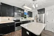 5203 Meadowbrook Drive, Trent Woods, NC 28562 — 3-bedroom home in Country Club Park, Trent Woods, NC, photo 3 of 61: Kitchen's Marble Countertops
