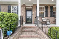 1310 Grandiflora Drive, Leland, NC 28451 — 4-bedroom home in Magnolia Greens, Leland, NC, photo 3 of 56: 8_front entryway