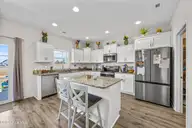 646 Indigo Johnston Drive, Jacksonville, NC 28546 — 5-bedroom home in Onslow Bay, Jacksonville, NC, photo 13 of 54: 15_kitchen