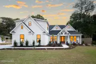 385 Crow Creek Drive NW, Calabash, NC 28467 — 4-bedroom home in Crow Creek, Calabash, NC, photo 2 of 41: CDWK_2211_EXT_02