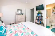 1131 S Shore Drive, Surf City, NC 28445 — 4-bedroom waterfront home in Horse Hammock, Surf City, NC, photo 11 of 40: Top Floor Queen Bedroom II