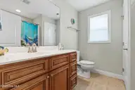 133 NE 3rd Street, Oak Island, NC 28465 — 3-bedroom home, Oak Island, NC, photo 18 of 27: 2nd Bathroom