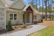 128 Banbridge Drive, Seven Lakes, NC 27376 — 4-bedroom home in Seven Lakes West, Seven Lakes, NC, photo 2 of 49: Front porch