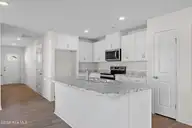 1030 Beechridge Drive SW 73, Ocean Isle Beach, NC 28469 — 4-bedroom home in Glendale Arbor, Ocean Isle Beach, NC, photo 6 of 35: 7_kitchen