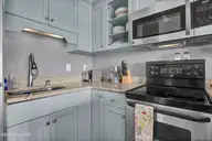 106 N Water Street 907, Wilmington, NC 28401 — 1-bedroom condo in Water Street Center Condo, Wilmington, NC, photo 14 of 34: Kitchen