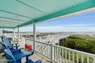 491 Ocean Boulevard W, Holden Beach, NC 28462 — 4-bedroom waterfront home in Holden Beach, Holden Beach, NC, photo 4 of 47: 491 Ocean Blvd W
