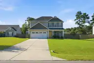 261 Bronze Drive, Rocky Point, NC 28457 — 3-bedroom waterfront home in The Knolls at Turkey Creek, Rocky Point, NC, photo 1 of 58