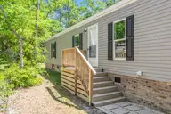 3440 Dolphin Drive, Bolivia, NC 28422 — 3-bedroom manufactured home in River Run Plantation, Bolivia, NC, photo 2 of 46: 3440 Dolphin-2
