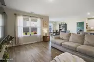 8162 Finchley Street NE, Leland, NC 28451 — 3-bedroom home in SeaBrooke, Leland, NC, photo 22 of 48: 30_living room dining