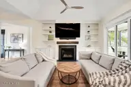 9599 Fallen Pear Lane NE, Leland, NC 28451 — 4-bedroom home in The Bluffs on the Cape Fear, Leland, NC, photo 12 of 72: Living room