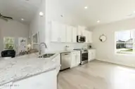 131 White Bark Avenue Lot 16, Rocky Mount, NC 27804 — 4-bedroom home in Longneedle, Rocky Mount, NC, photo 11 of 28: 1830 Kitchen