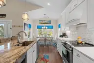 314 NE 61st Street, Oak Island, NC 28465 — 3-bedroom home in Tranquil Harbor, Oak Island, NC, photo 10 of 70: 12-web-or-mls-cammediallc.com (44 of 67)