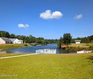 307 Antioch Lakes Road, New Bern, NC 28560 — 3-bedroom waterfront home in The Lakes at Antioch, New Bern, NC, photo 5 of 6: dock 2